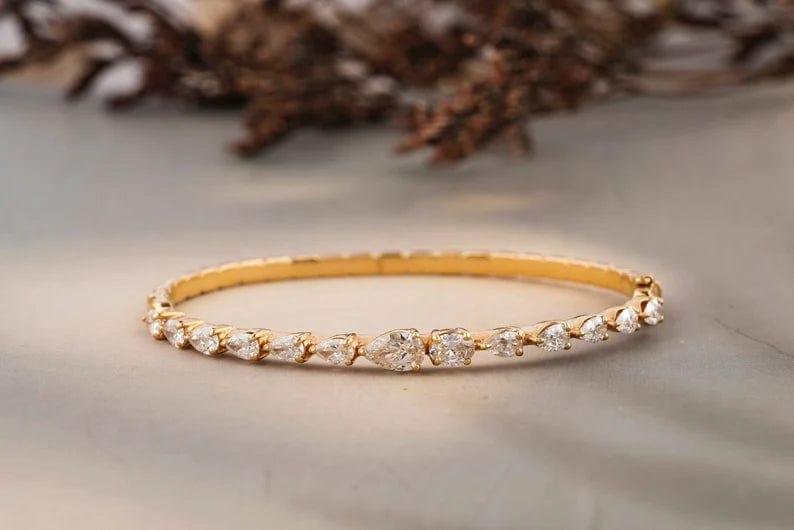 14k Gold Ulternative Pear/Oval Bangle Bracelet - JBR Jeweler
