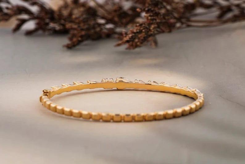 14k Gold Ulternative Pear/Oval Bangle Bracelet - JBR Jeweler