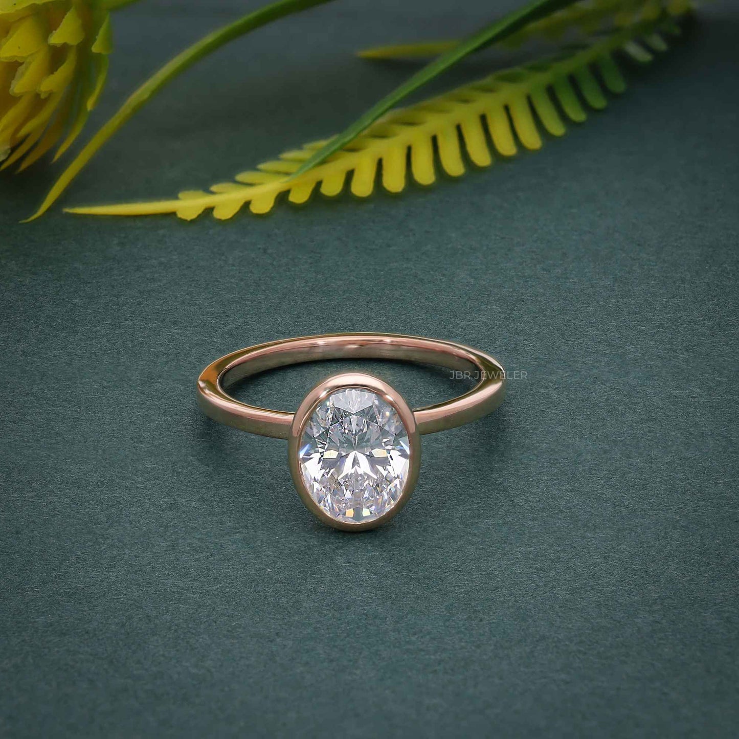 Classic Bezel Set Oval Lab Grown Diamond Engagement Ring