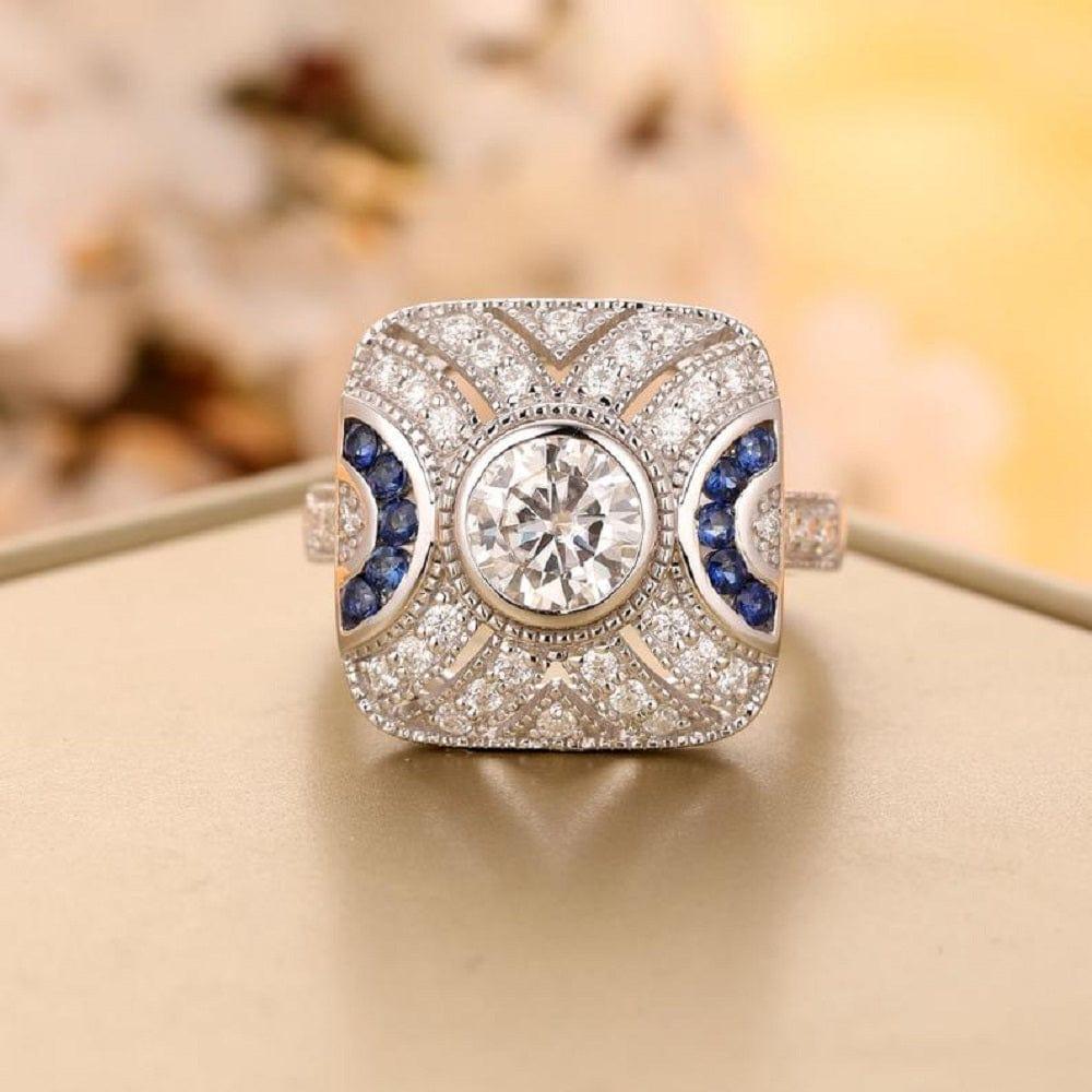 Art Deco 0.80CT Round Cut White Gold Sapphire Accents Moissanite Engagement Ring - JBR Jeweler