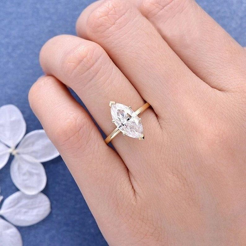 Marquise cut engagement clearance ring yellow gold