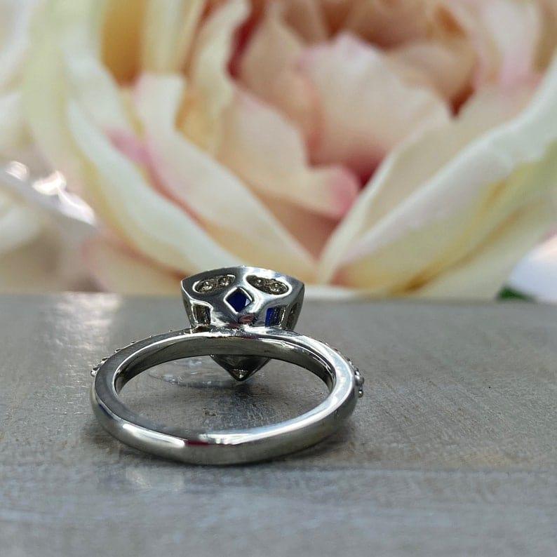 Triangle discount sapphire ring